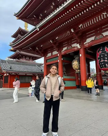 Naqiudin at a temple gate in Asakusa