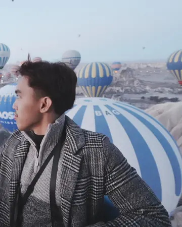 Naqiudin watching hot-air balloons in Cappadocia